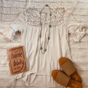 Cream top with embroidery detail
